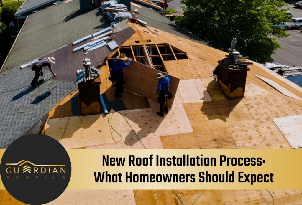 Roof installation in progress with workers applying new shingles