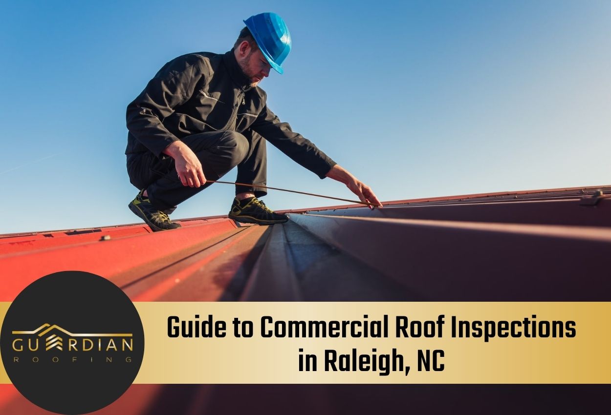 Inspector measuring a red metal roof under clear blue sky